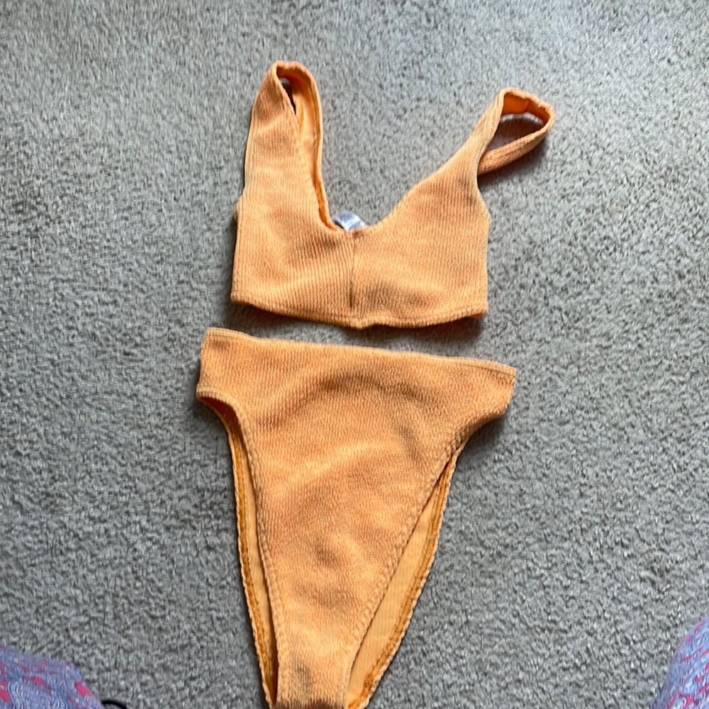 Towel material bright orange bikini